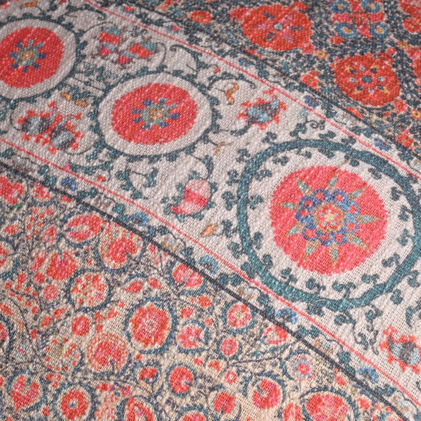 Vintage-Inspired Round Ottoman with Intricate Floral Design - ART AKASHA STUDIO