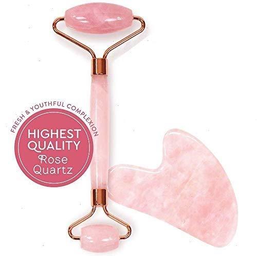 Rose quartz facial roller and gua sha tool set for skincare and youthful complexion